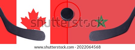 Top view hockey puck with Canada vs. Morocco command with the sticks on the flag. Concept hockey competitions