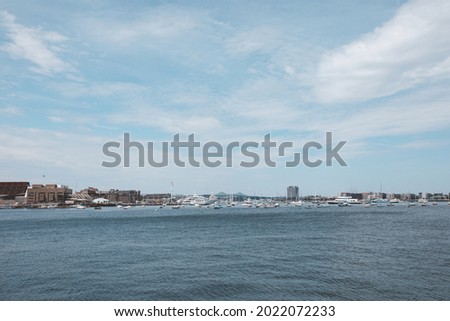Boston skyline and Sailboat seen from Piers Park, Massachusetts, USA