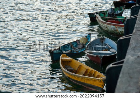 small fisherman wooden boat moored in port. located at Terengganu, Malaysia