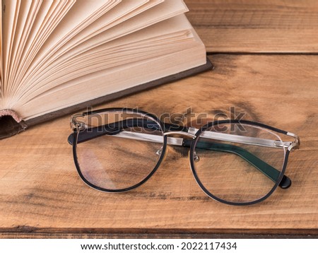 Glasses with book education and knowledge concept picture