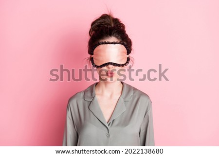Photo of nice hairdo charming person wear eye sleep mask kiss lips isolated on pink color background Royalty-Free Stock Photo #2022138680