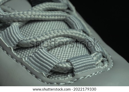 Close up beautiful shoeloces shoes background pattern texture. Macro photography view.