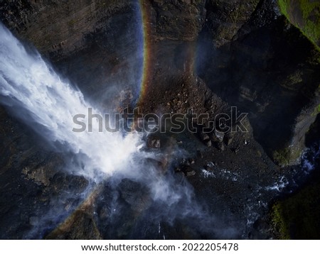 Haifoss waterfall in the highlands of Iceland, Aerial view. Dramatic landscape of Waterfall in Landmannalaugar canyon.