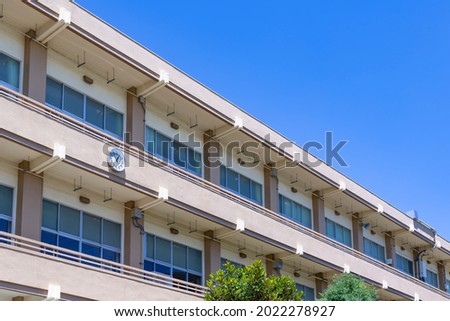 School building and blue sky (educational image) Royalty-Free Stock Photo #2022278927