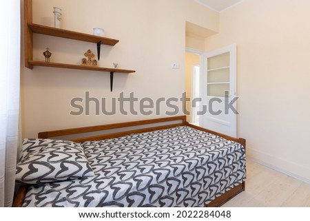 Interior of a bedroom with laminate floor