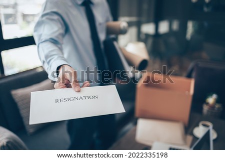 Businessman sending and showing resignation letter to employer boss. Quitting a job, businessman fired or leave a job concept.