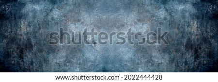 Dramatic blue shades painted canvas and muslin cloth studio background, fitting for  advertising and concepts. 