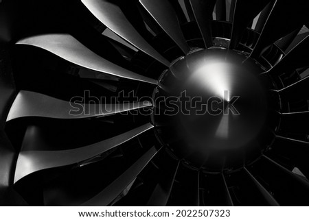 Modern turbofan engine. close up of turbojet of aircraft on black background. blades of the turbofan engine of the aircraft Royalty-Free Stock Photo #2022507323