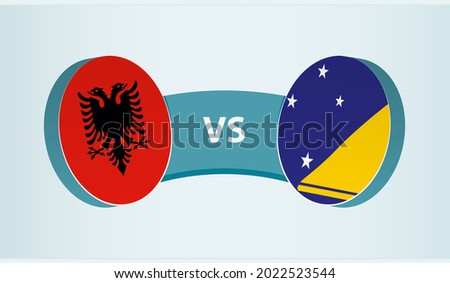 Albania versus Tokelau, team sports competition concept. Round flag of countries.