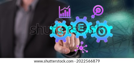 Man touching a seo concept on a touch screen with his finger