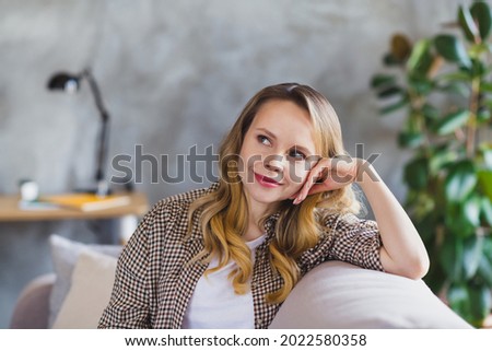 Photo of sweet resting blond hair lady look hands head wear brown jacket at home alone