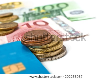 debit card and euro bills