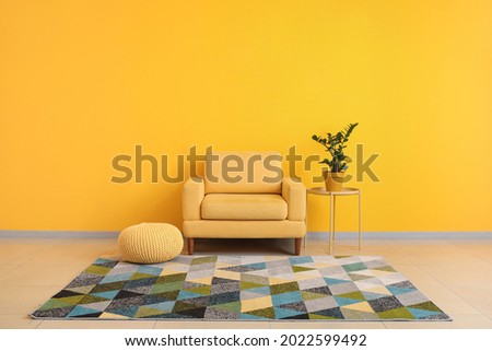 Interior of room with comfortable armchair Royalty-Free Stock Photo #2022599492