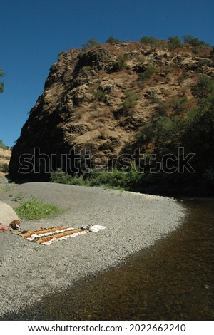 Mountainside swimming in Northern California river.