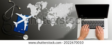 Mock up image of medical stethoscope, passport, laptop computer, air plane isolated on World map background. Trip, travel and insurance concept. Royalty-Free Stock Photo #2022670010