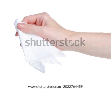 White napkin in hand on white background isolation Royalty-Free Stock Photo #2022764459