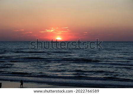 Beautiful sunset by the sea in summer.