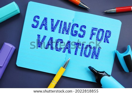 Financial concept about Savings For Vacation with inscription on the piece of paper. 
