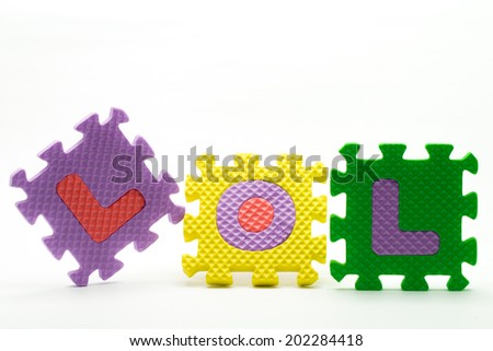 alphabet puzzle colorful shooting in white backtground