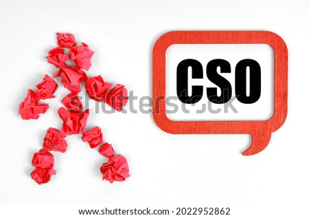 Business concept. On a white background, a red paper man and a sign with the inscription -CSO
