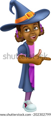 A young black little girl cartoon child character dressed in Halloween witch costume peeking around a background sign and pointing