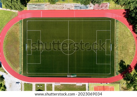 Aerial view of football and soccer field. Stadium with treadmill