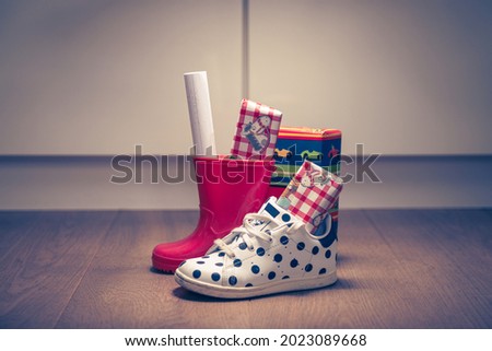 Sinterklaas feest, children put down the shoe, early in the morning, typical Dutch party tradition, get presents, sweets and a letter in your shoe, (put the shoe down) December 5, Santa claus,  Royalty-Free Stock Photo #2023089668