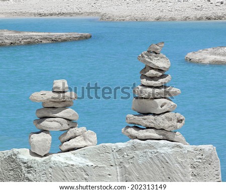 Rock cairn symbolizes a stable equilibrium