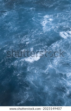 Aerial view of the ocean waves. Blue water background abstract texture. Atlantic ocean
