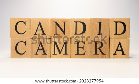 Candid camera was created from wooden cubes. News and journalism concepts. close up.