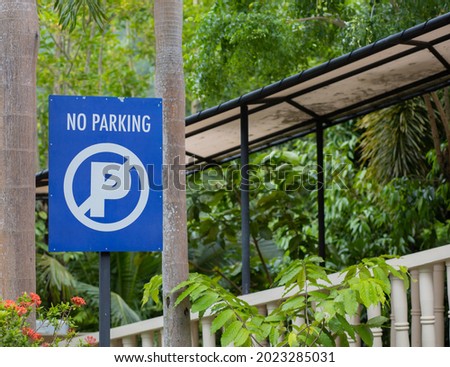 Prohibition sign, blue and white parking sign