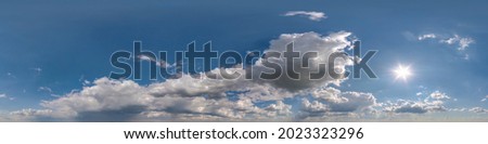 hdri 360 panorama of blue sky with white beautiful clouds. Seamless panorama with zenith for use in 3d graphics or game development as sky dome or edit drone shot for sky replacement