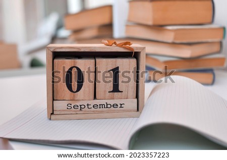 wooden calendar 1st september on the table at home autumn sale, back to school