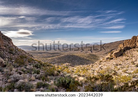Chihuahuan Desert Spreads Out Under Whispy Clouds and Blue Sky in Big Bend National Park Royalty-Free Stock Photo #2023442039
