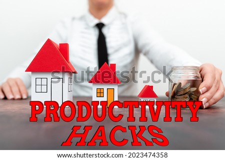 Handwriting text Productivity Hacks. Internet Concept tricks that you get more done in the same amount of time Different plans for houses represented by business woman