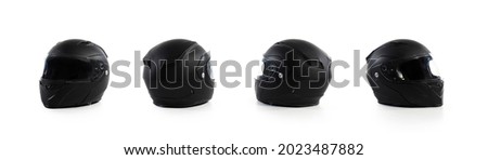 Black motorcycle helmet on a white background, back, side Royalty-Free Stock Photo #2023487882