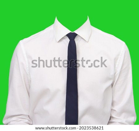 White men's shirt with dark blue tie. Image on a green background for photomontage. Royalty-Free Stock Photo #2023538621