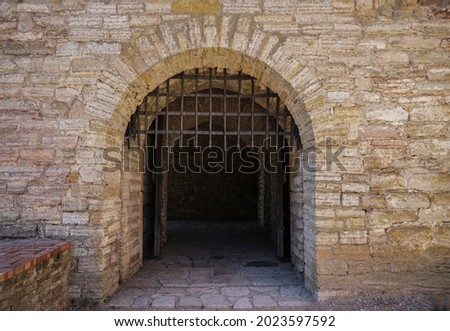 Ancient castle palace. Castle wall tower and door gate. Castles walls and door isolated. Castles palace fort landscape background. Stone architecture Giant metal door gate
