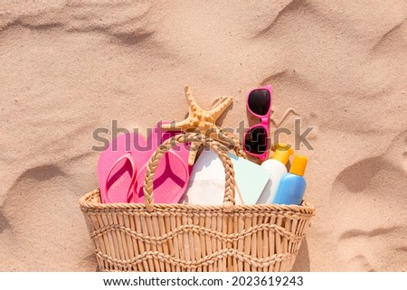 Bag with beach accessories at resort