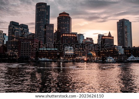 Panoramic view of the Boston Harbor in Boston, Massachusetts, USA at twilight.