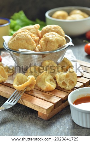Fried meatballs with ingredients on the table, Indonesian street food