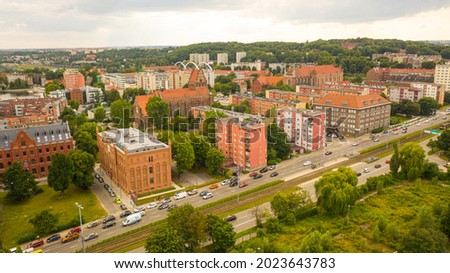 Gdansk, Poland,Europe. Beautiful panoramic aerial photo from drone to old city Gdansk, Motlawa river and Gothic St Mary church, city hall tower, the oldest medieval port crane (Zuraw) and old houses

