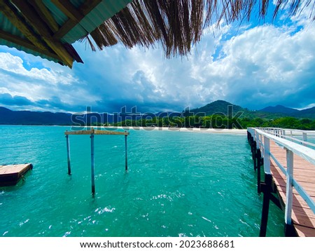 Ocean, Island view from Jetty at Tokeh Beach Resort, Freetown, Sierra Leone. A Paradise on Earth. Royalty-Free Stock Photo #2023688681