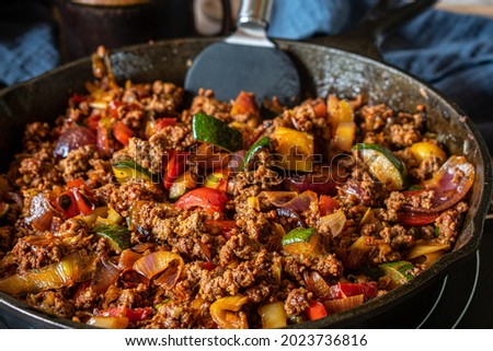 Pan-fried ground beef with vegetables Royalty-Free Stock Photo #2023736816