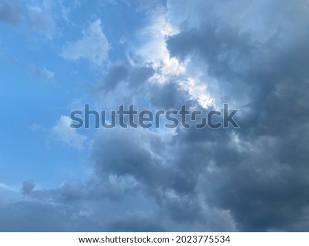 Cloud cover on blue clear sky on sunny day