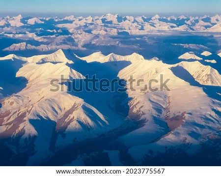 Top view of snow mountain from over the sky