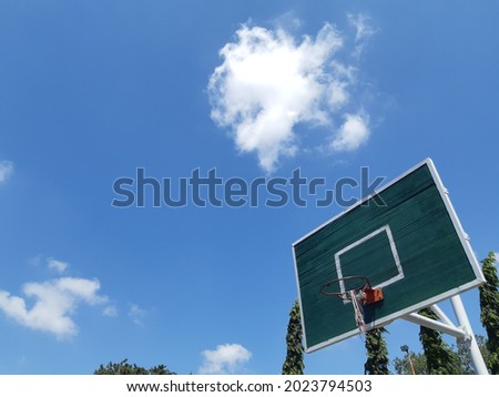 Basketball board with cloud and blue sky background