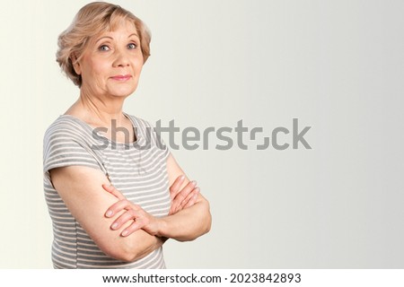 Gorgeous happy smiling age woman looking at camera portrait