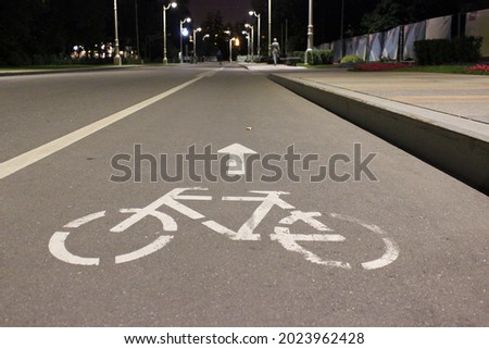 Bicycle path road sign. Road markings on the city street. Eco-friendly travel. Healthy lifestyle.