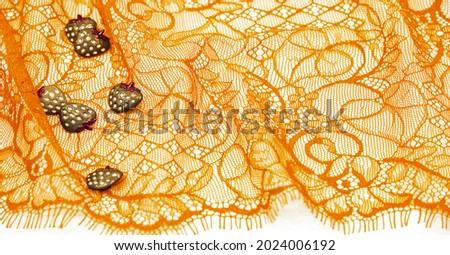 Yellow lace fabric. Royal yellow lace patch with haute couture decoration, accessories for your design, couture ribbon, bright decoration. Texture Background Pattern